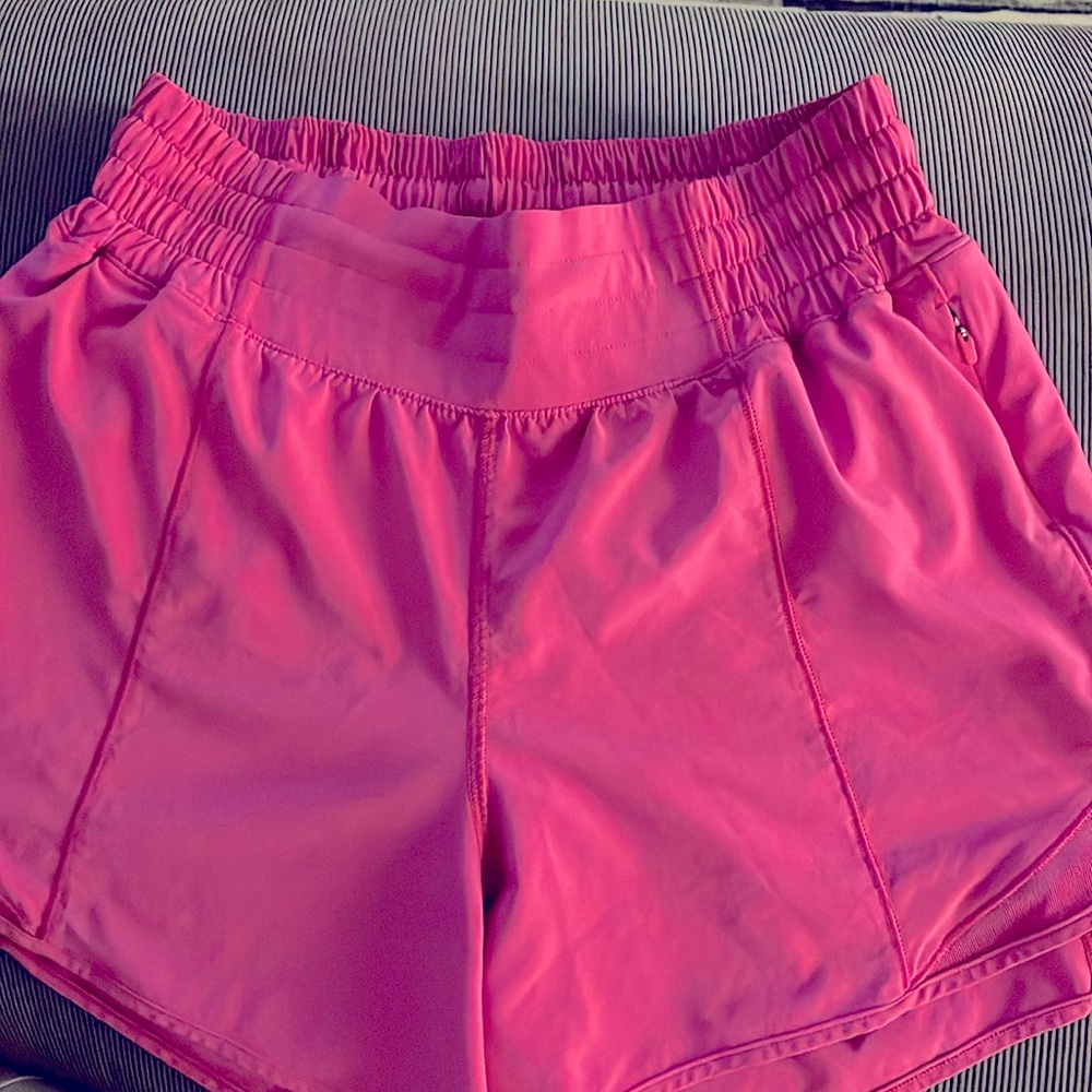 Lululemon pink shorts, size 4. Worn several times well taken care of.